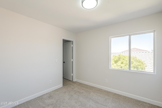 12813 W Paradise Dr, El Mirage, AZ 85335 - empty room with light colored carpet and baseboards
