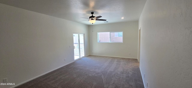 carpeted empty room with ceiling fan