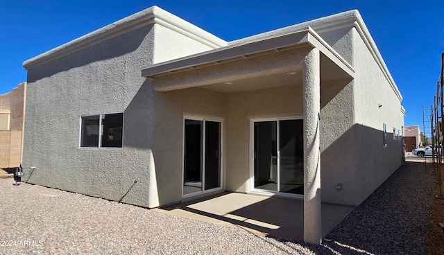 rear view of house featuring a patio area