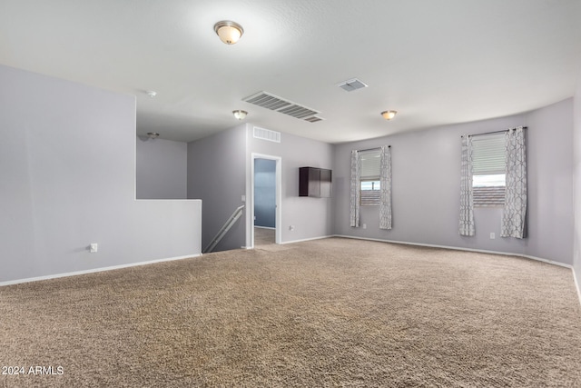 unfurnished room with carpet flooring