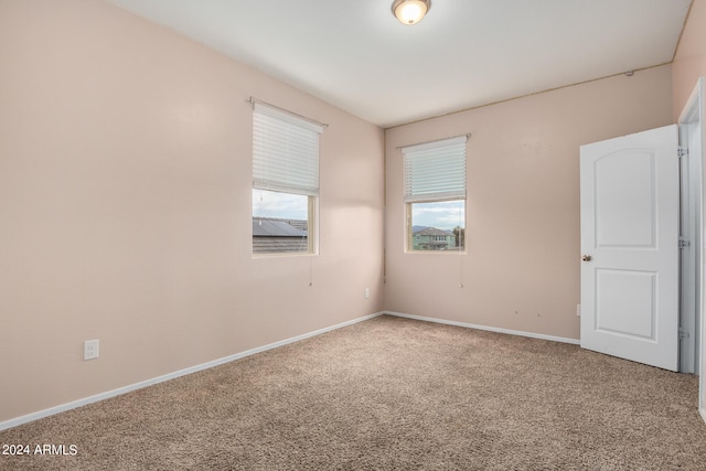 view of carpeted spare room