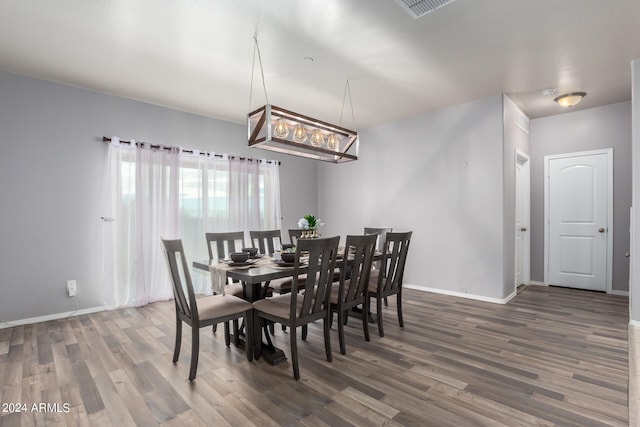 dining room featuring dark hardwood / wood-style flooring