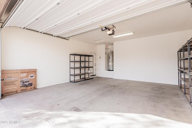 garage featuring a garage door opener and electric water heater