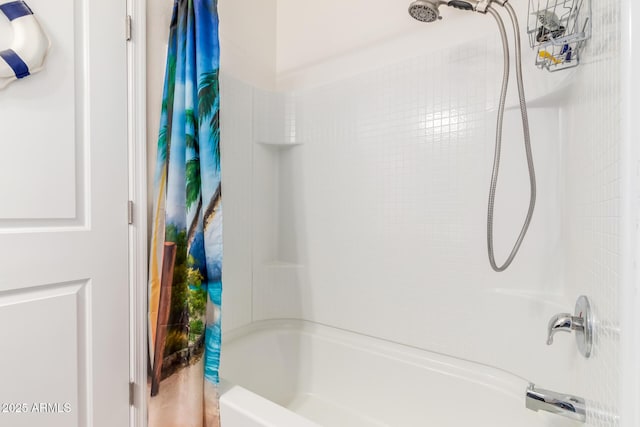 bathroom with shower / bath combination with curtain