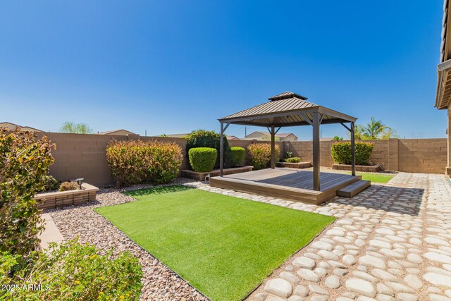 303 W Mammoth Cave Dr, San Tan Valley, AZ 85140 - view of yard with a gazebo, a deck, and a fenced backyard