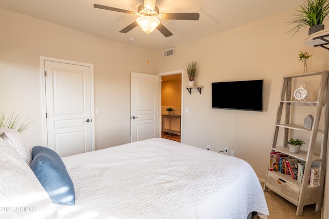 bedroom featuring ceiling fan and carpet floors