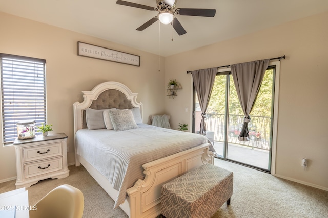 carpeted bedroom featuring multiple windows, access to outside, and ceiling fan