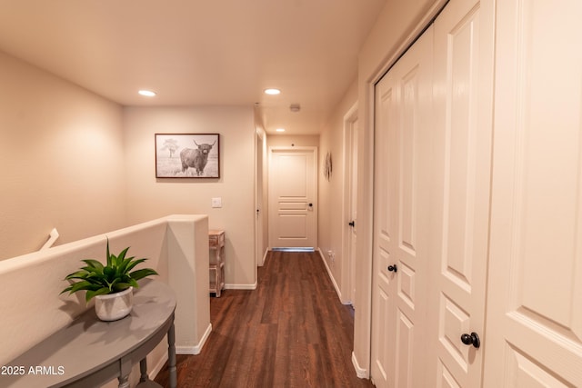 hall with dark hardwood / wood-style flooring