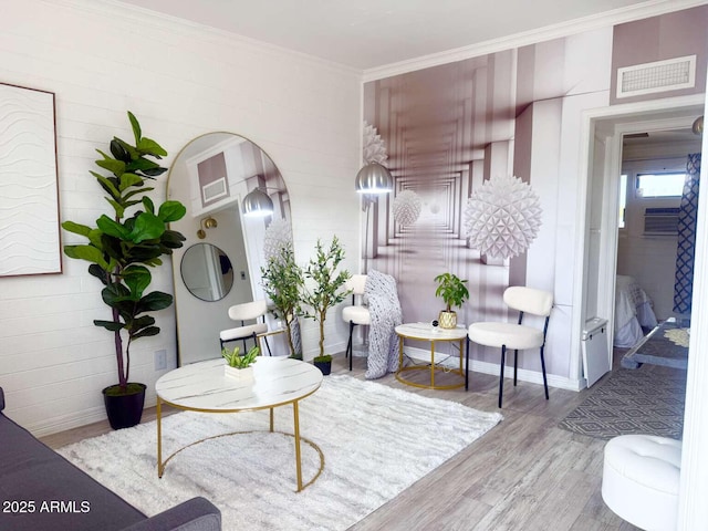 2150 W Missouri Ave Unit 120, Phoenix, AZ 85015 - interior space with wood finished floors, arched walkways, baseboards, ornamental molding, and visible vents