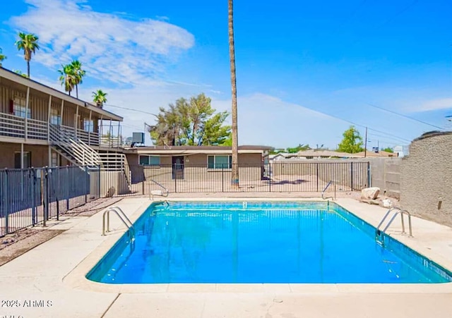 2150 W Missouri Ave Unit 120, Phoenix, AZ 85015 - view of swimming pool featuring fence and a fenced in pool