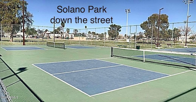2150 W Missouri Ave Unit 120, Phoenix, AZ 85015 - view of sport court with community basketball court and fence