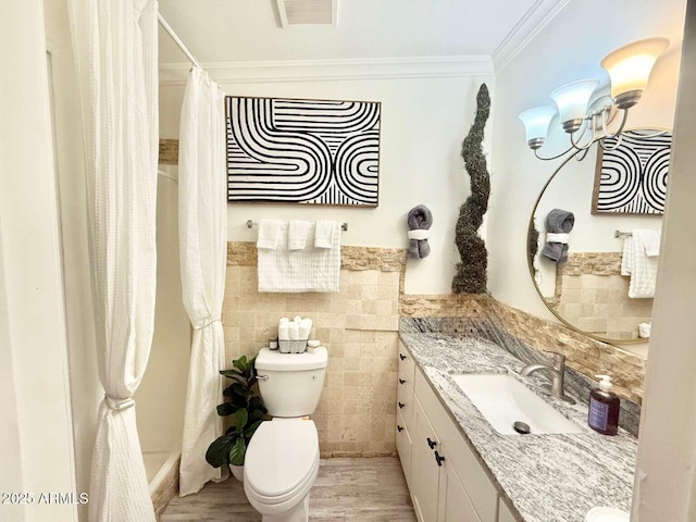 2150 W Missouri Ave Unit 120, Phoenix, AZ 85015 - full bathroom featuring wood finished floors, visible vents, toilet, vanity, and ornamental molding