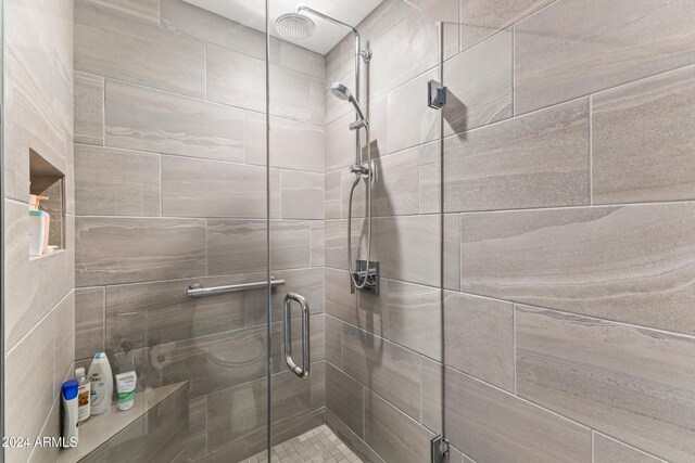 bathroom with an enclosed shower