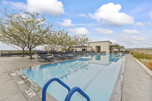 view of pool with a patio