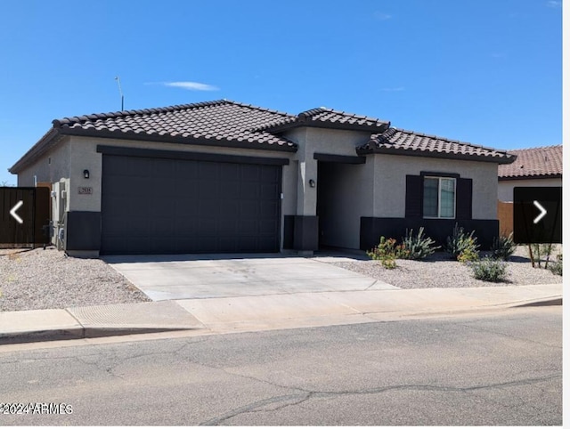 view of front of property featuring a garage