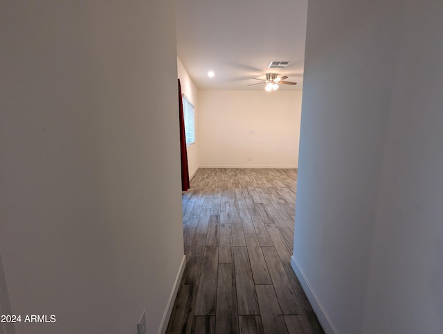 corridor featuring hardwood / wood-style flooring