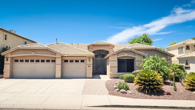 view of front of property with a garage