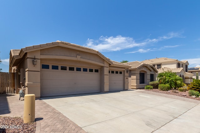 view of front of home with a garage