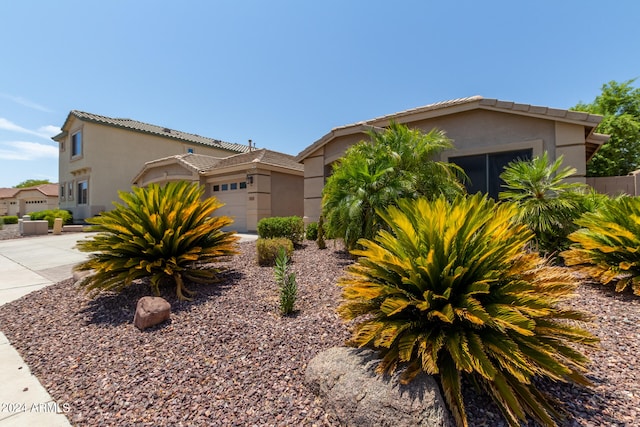 view of front of property with a garage