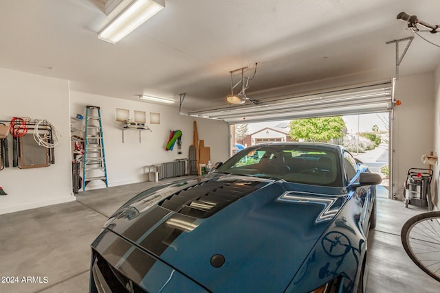 garage featuring a garage door opener