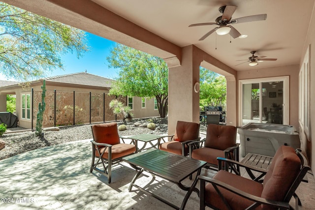 view of patio / terrace with ceiling fan and grilling area