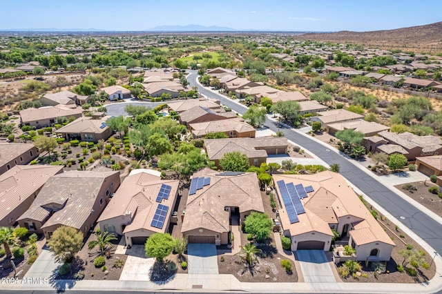 birds eye view of property featuring a mountain view