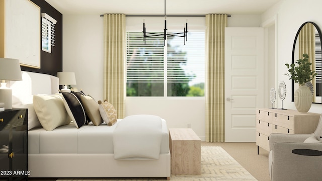 bedroom with a chandelier and light colored carpet