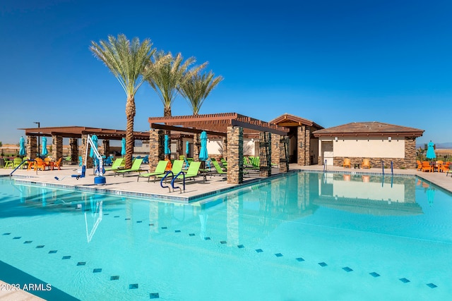 view of swimming pool featuring a patio