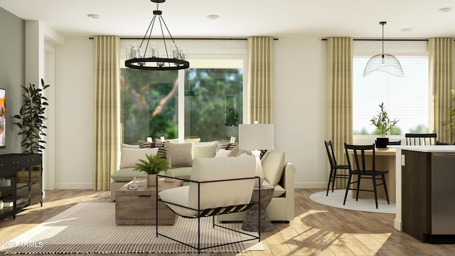 dining room with wood-type flooring and an inviting chandelier