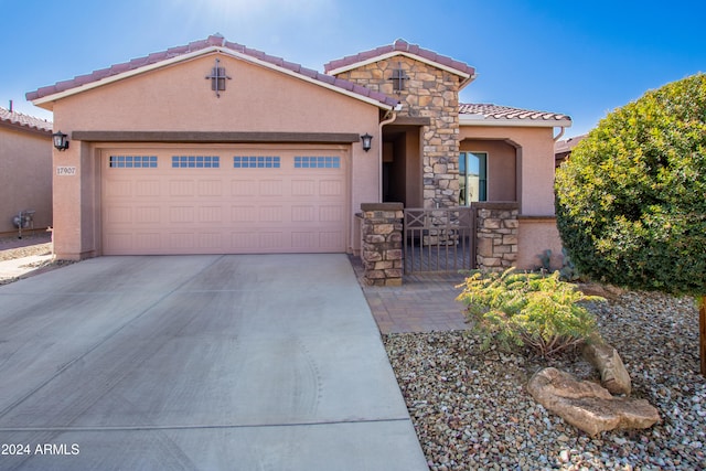 view of front of home with a garage