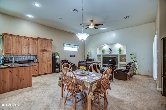 dining space featuring recessed lighting, a ceiling fan, visible vents, and baseboards