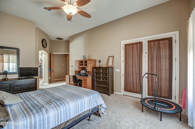 bedroom featuring ceiling fan, baseboards, visible vents, and light carpet