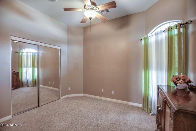 unfurnished bedroom with visible vents, baseboards, and carpet floors