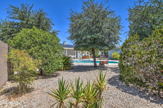 exterior space with a patio area and fence