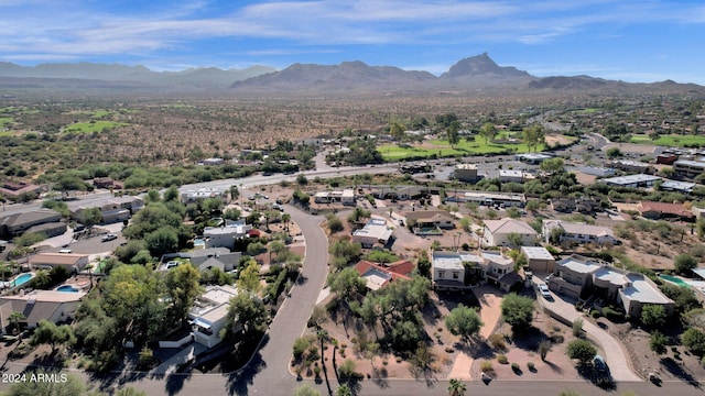 birds eye view of property with a mountain view