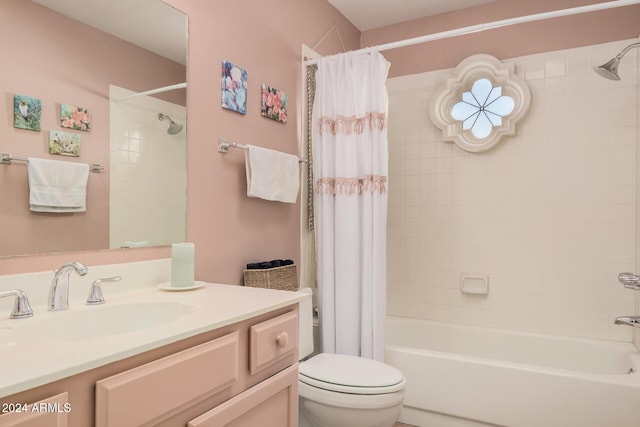 full bathroom with toilet, vanity, and shower / tub combo with curtain