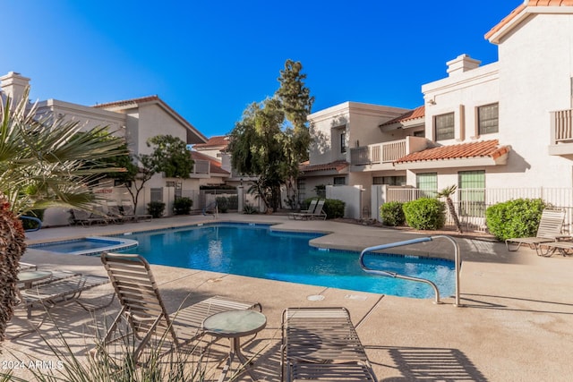 view of pool featuring a patio area