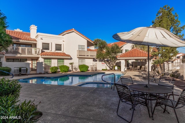 view of pool featuring a patio area and a gazebo