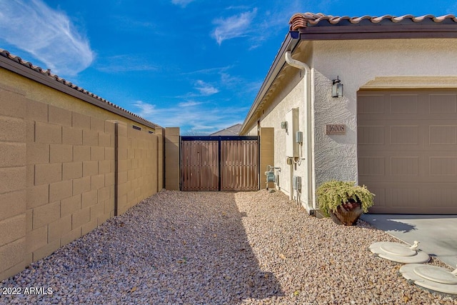 view of home's exterior with a garage