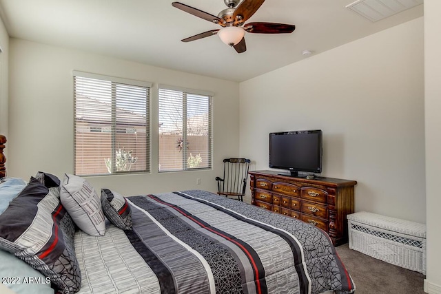 carpeted bedroom featuring ceiling fan