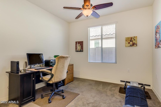 carpeted home office with ceiling fan