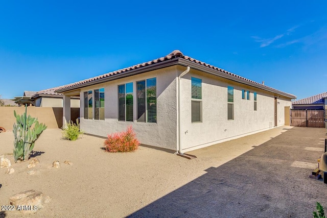 rear view of house with a patio