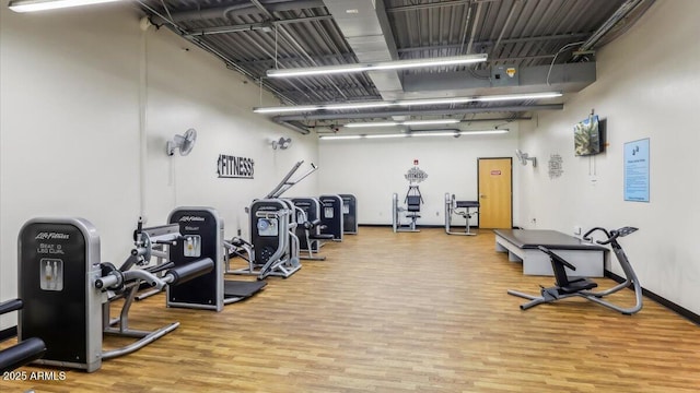 28242 N Nealite Dr, San Tan Valley, AZ 85143 - exercise room with wood finished floors