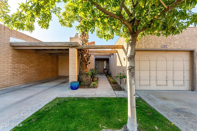 view of front of property with a carport