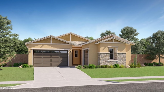 view of front facade with a garage and a front yard