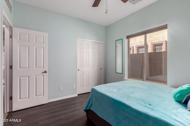 bedroom with a ceiling fan, baseboards, visible vents, dark wood-style flooring, and a closet