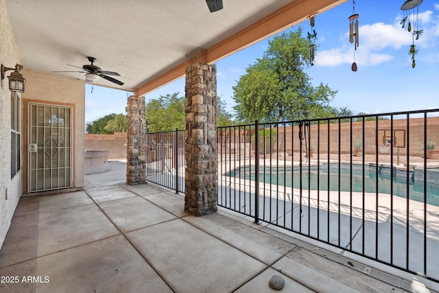 2024 N 125th Ave, Avondale, AZ 85392 - fenced backyard with a ceiling fan and a patio
