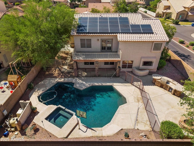 2024 N 125th Ave, Avondale, AZ 85392 - view of pool with a patio, a fenced backyard, and a pool with connected hot tub