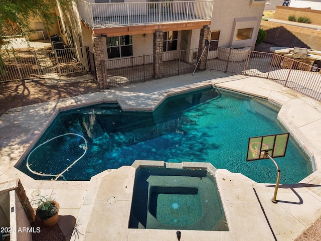 2024 N 125th Ave, Avondale, AZ 85392 - view of pool featuring a patio area and a pool with connected hot tub