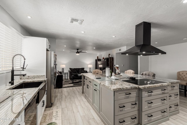 505 S S Rdg, Mesa, AZ 85204 - kitchen with island range hood, black electric cooktop, freestanding refrigerator, gray cabinets, and open floor plan